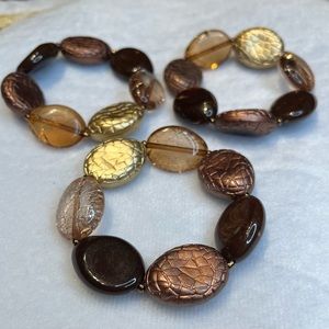 Set of 3 brown, neutral and gold tone stretchy bracelets